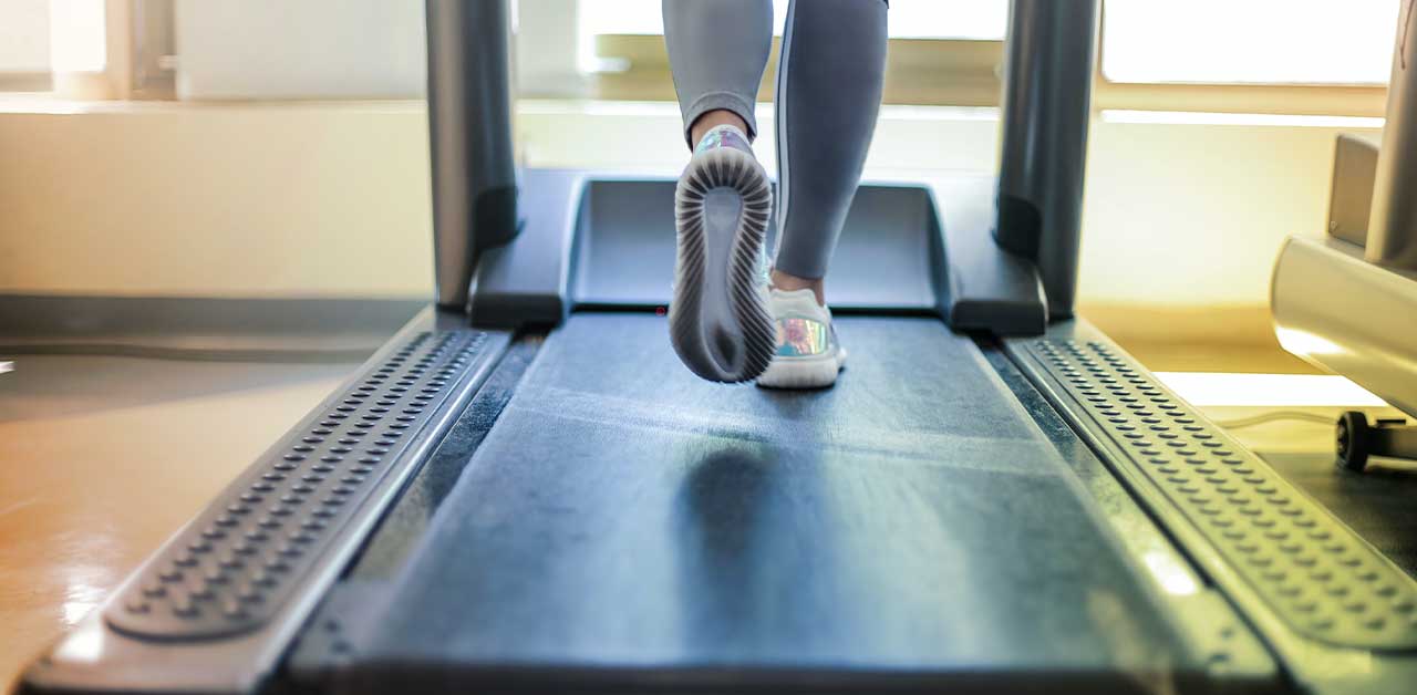 Person running on a treadmill