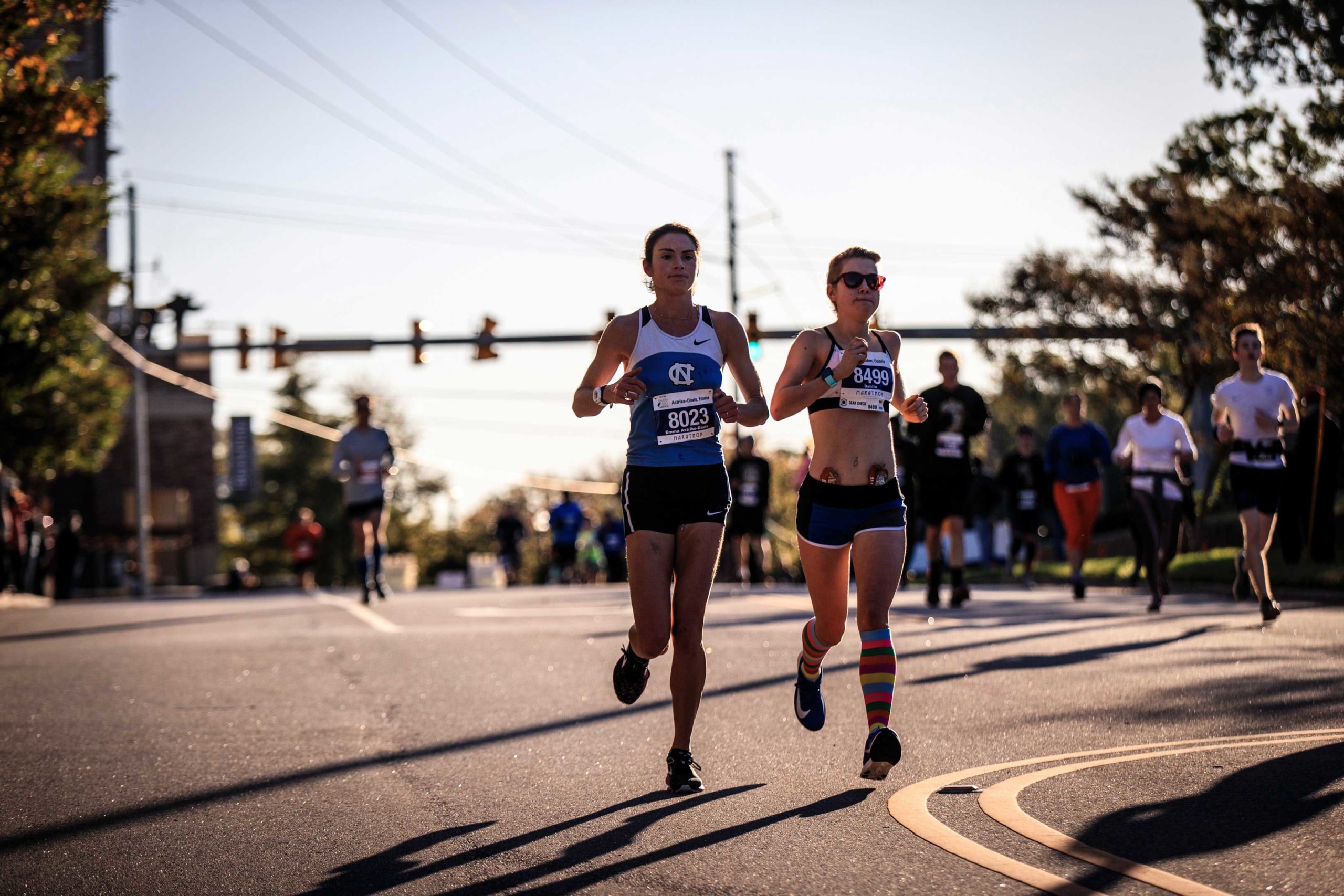 Two women competing in a running race