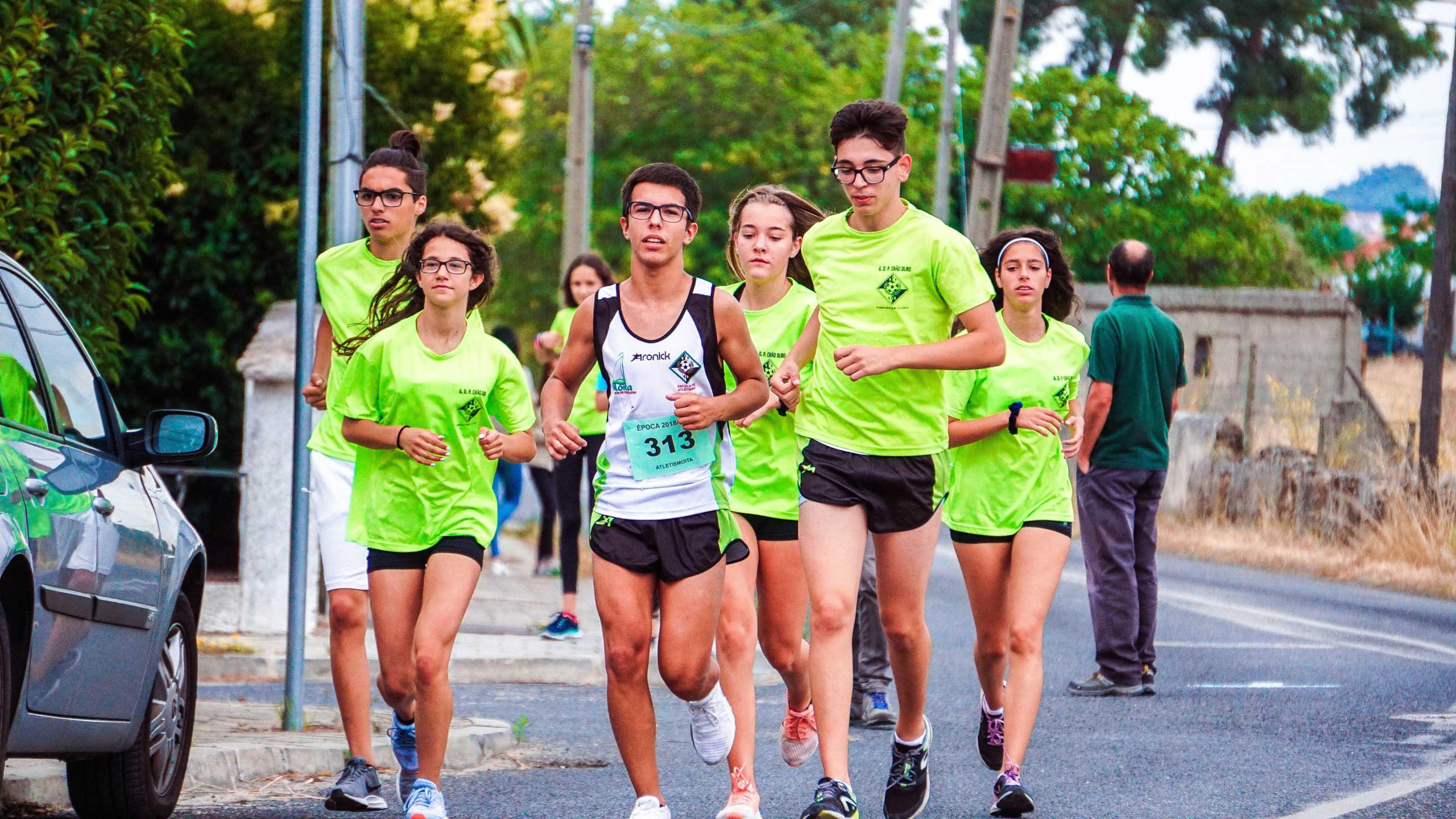 Group of people running together on the roads