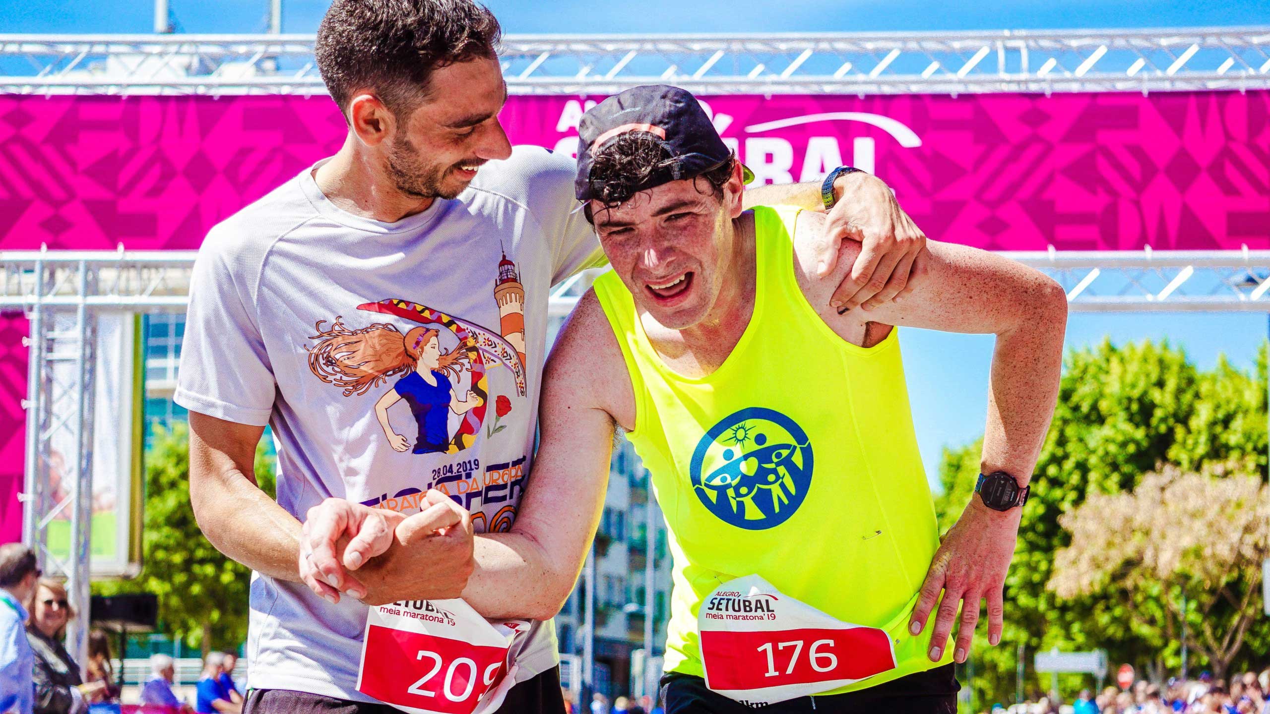 Two men after finishing a running race