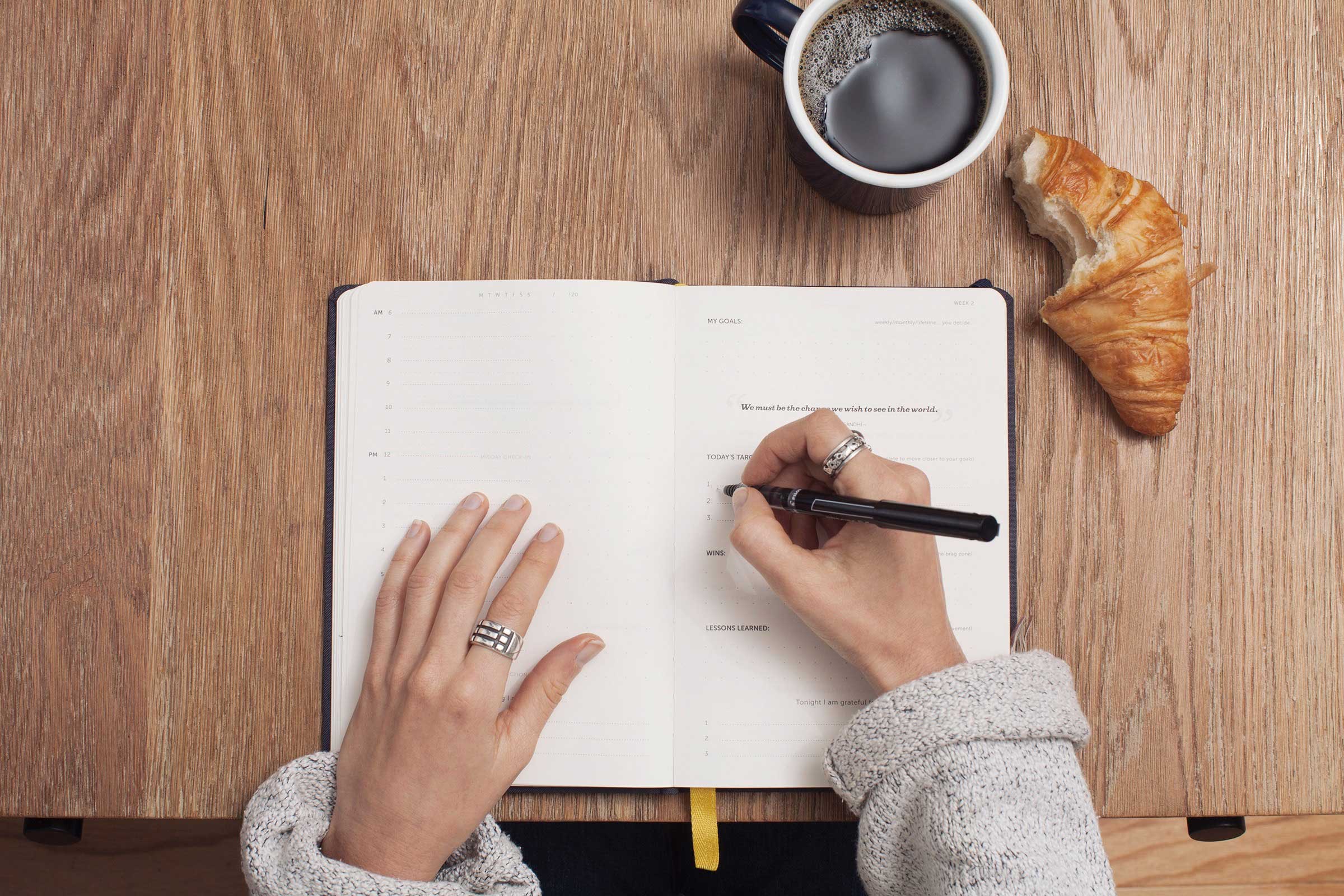 Woman filling out diary