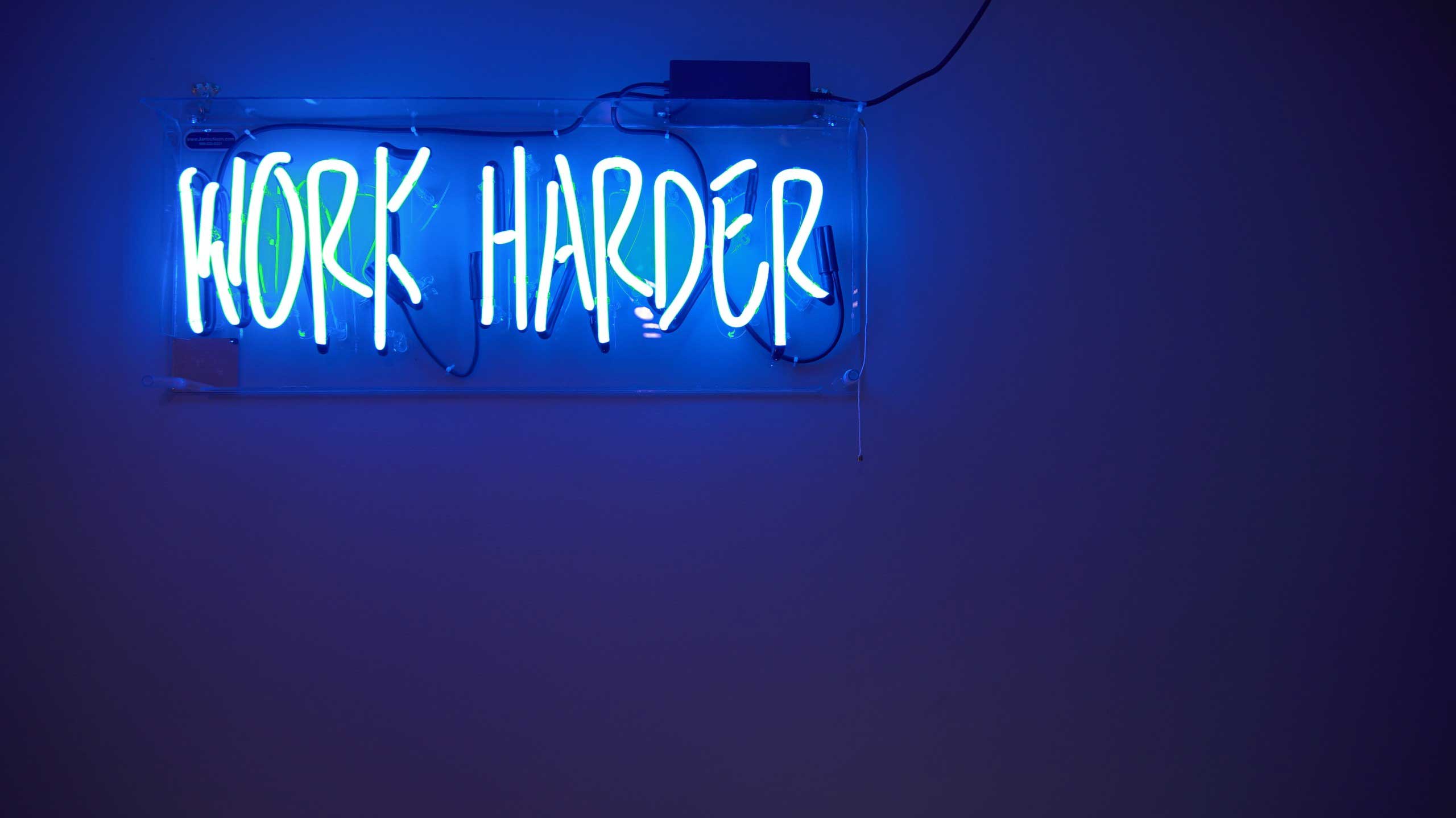 Work harder motivational sign