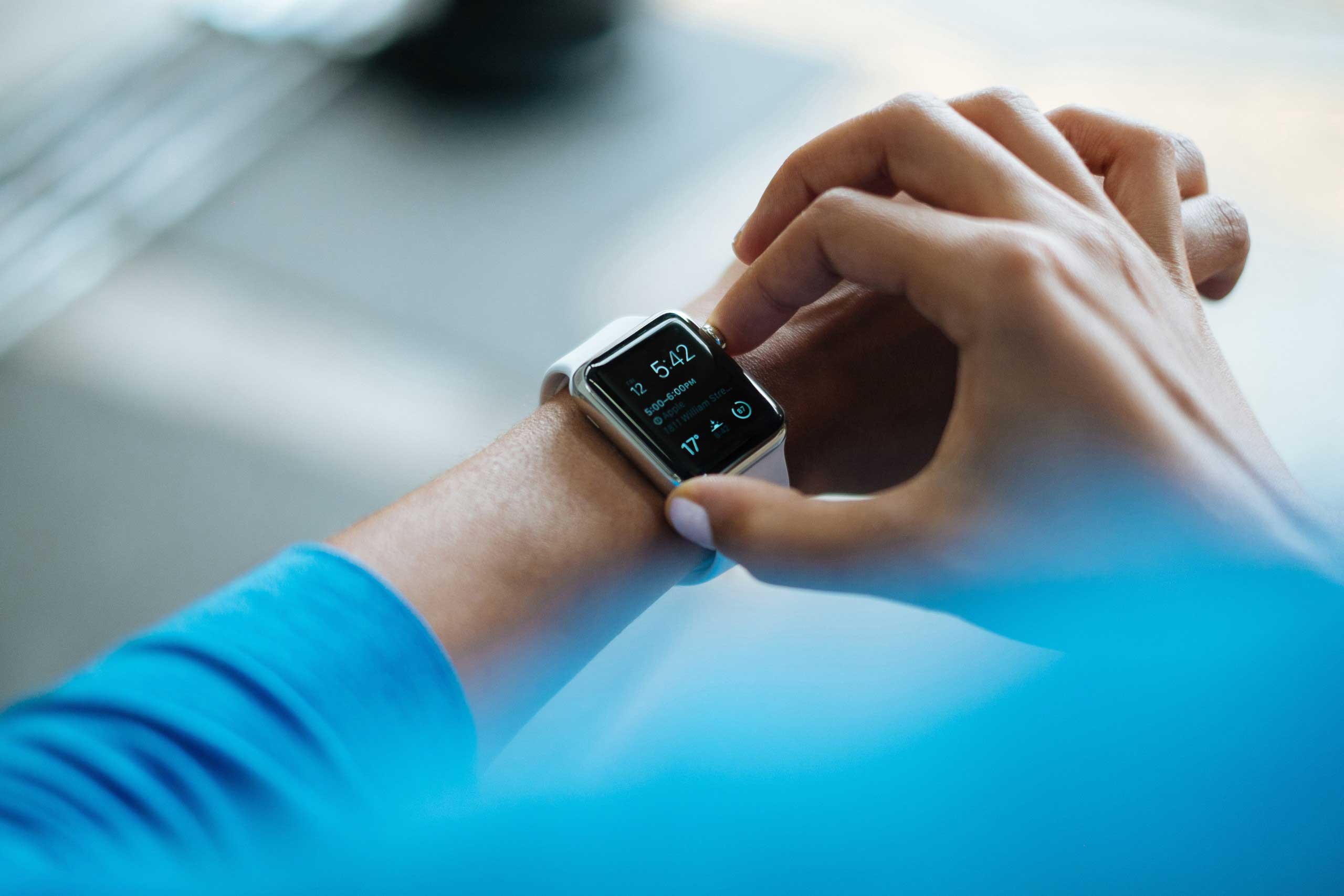 Person checking running watch