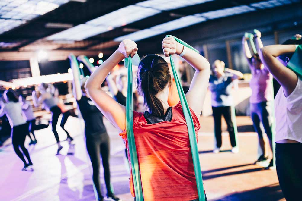 group of women stretching and warming up