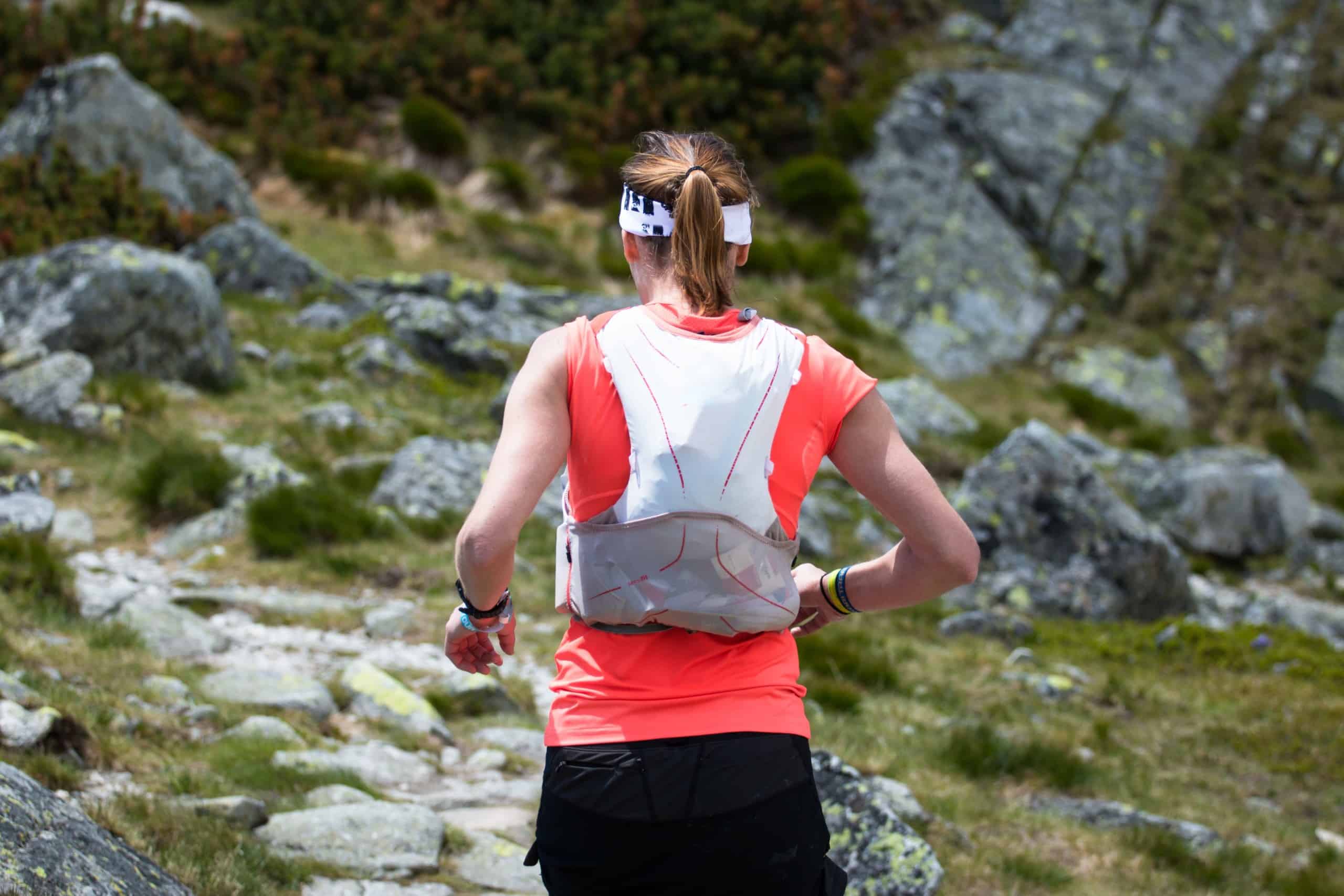 Ultra runner wearing a backpack on the trails