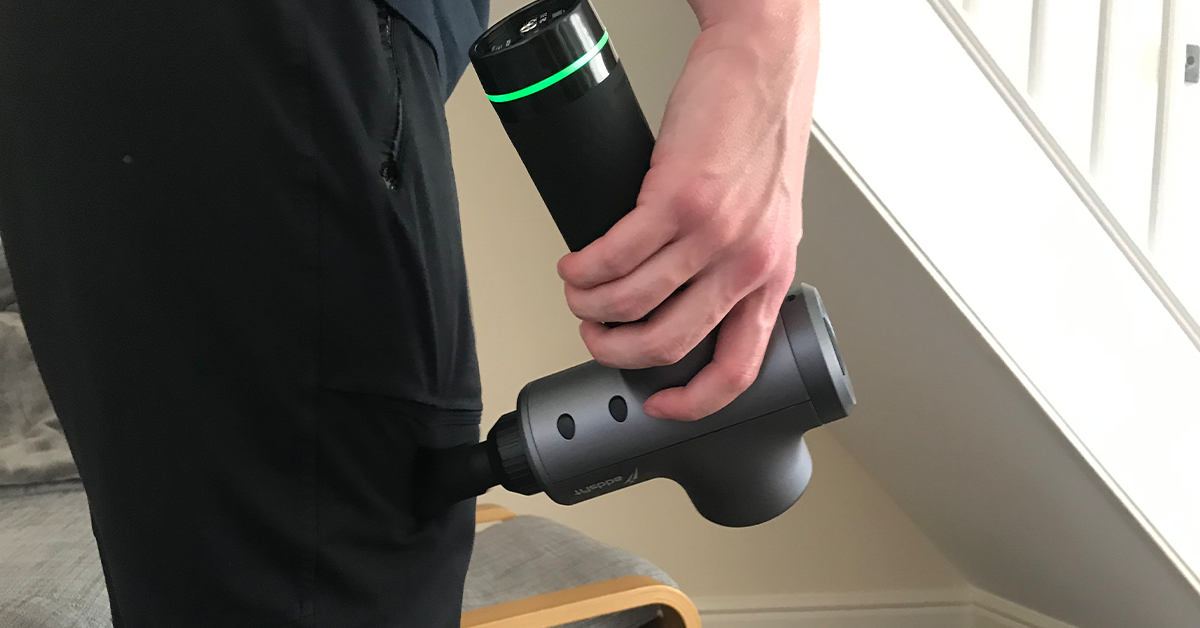 Example of a person using a massage gun