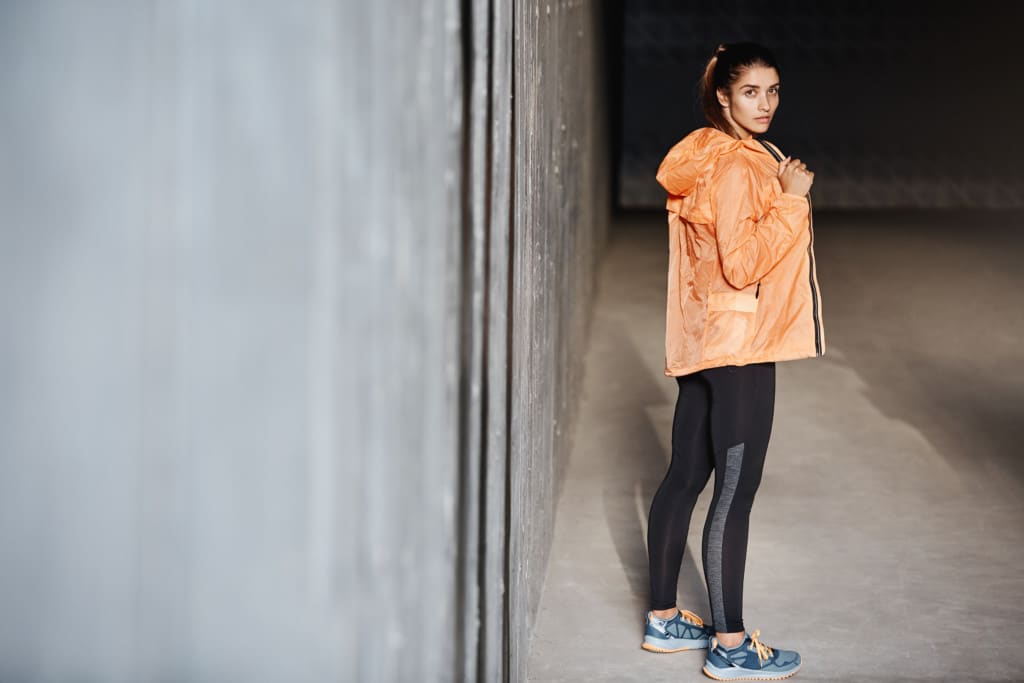 Woman wearing a reflective running jacket