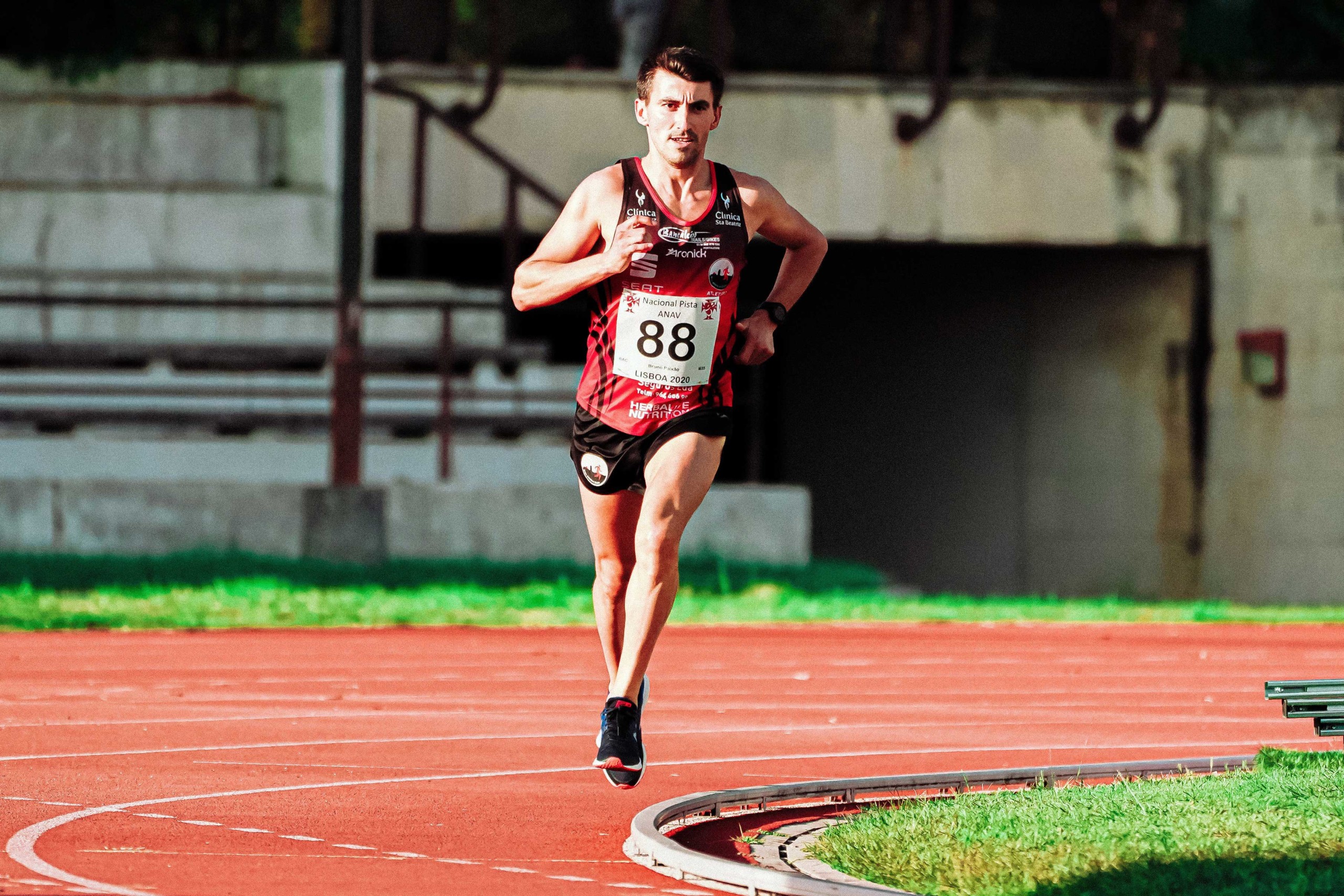 Man running on an outdoor running track