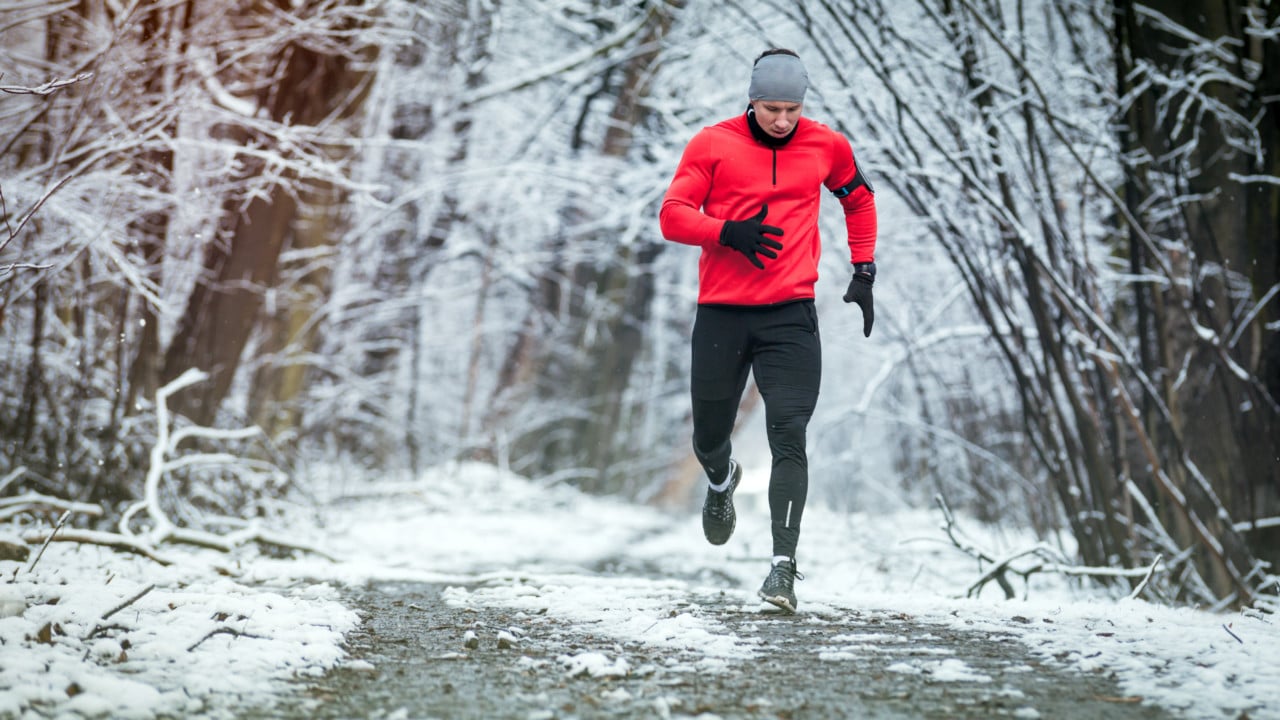 Man running in winter running gear